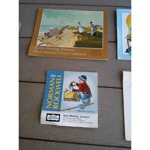 Lot of calendars.  Norman Rockwell calendars e.t.c